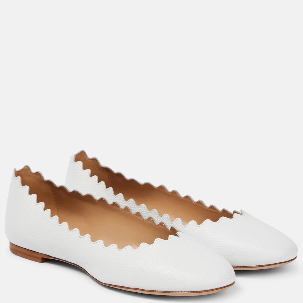 Beautiful white  patent leather ballerina flat. Brand new in box! Never worn!
